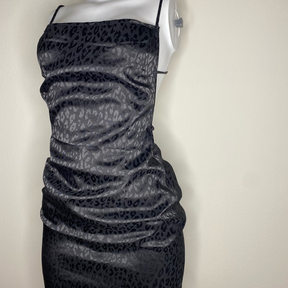 Black cheetah print open back mini dress